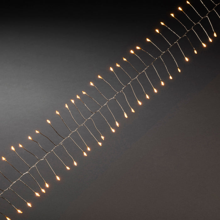 Konstsmide LED micro light chain Firecracker, amber, 7m, 200 LEDs